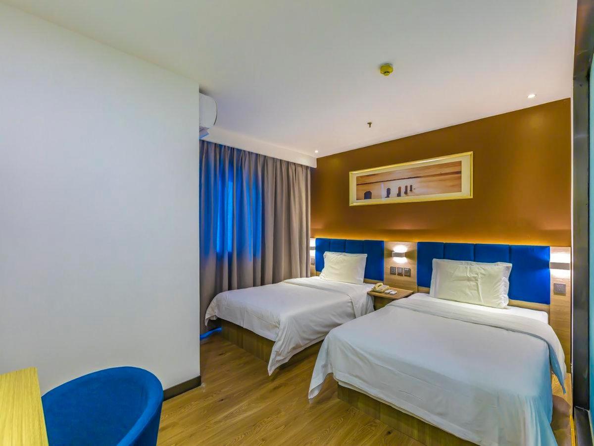 7 Days Premium Beijing Tiananmen Branch Hotell Exteriör bild